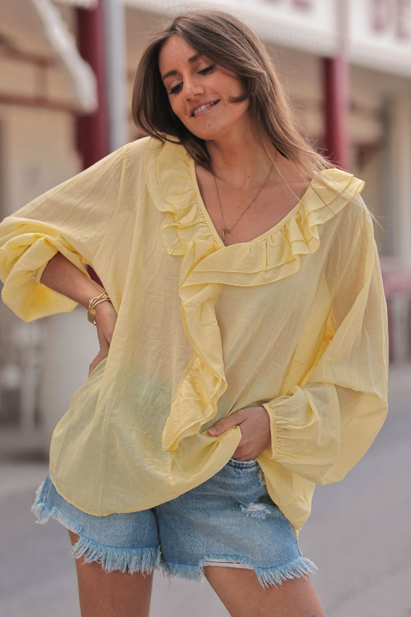 Tunique large voile de coton jaune manches longues avec volant au col