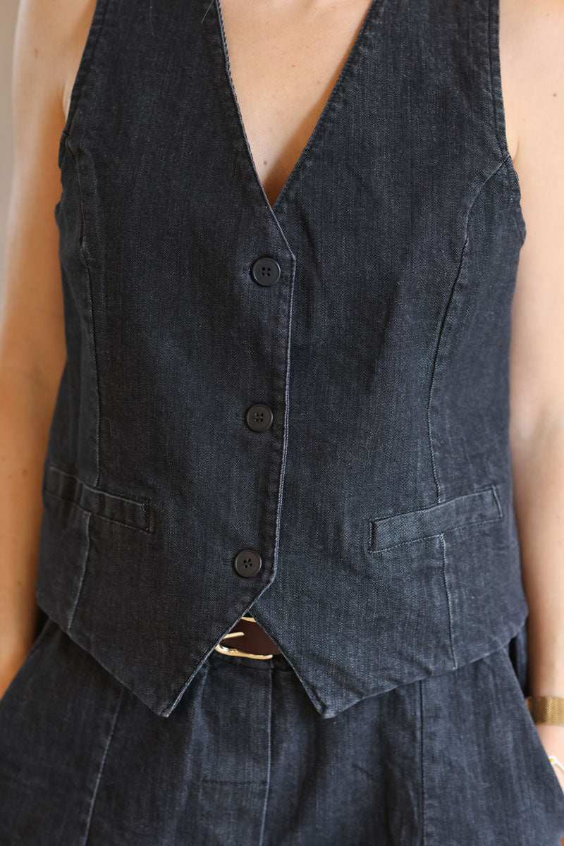 Veston de costume sans manches en jean noir délavé