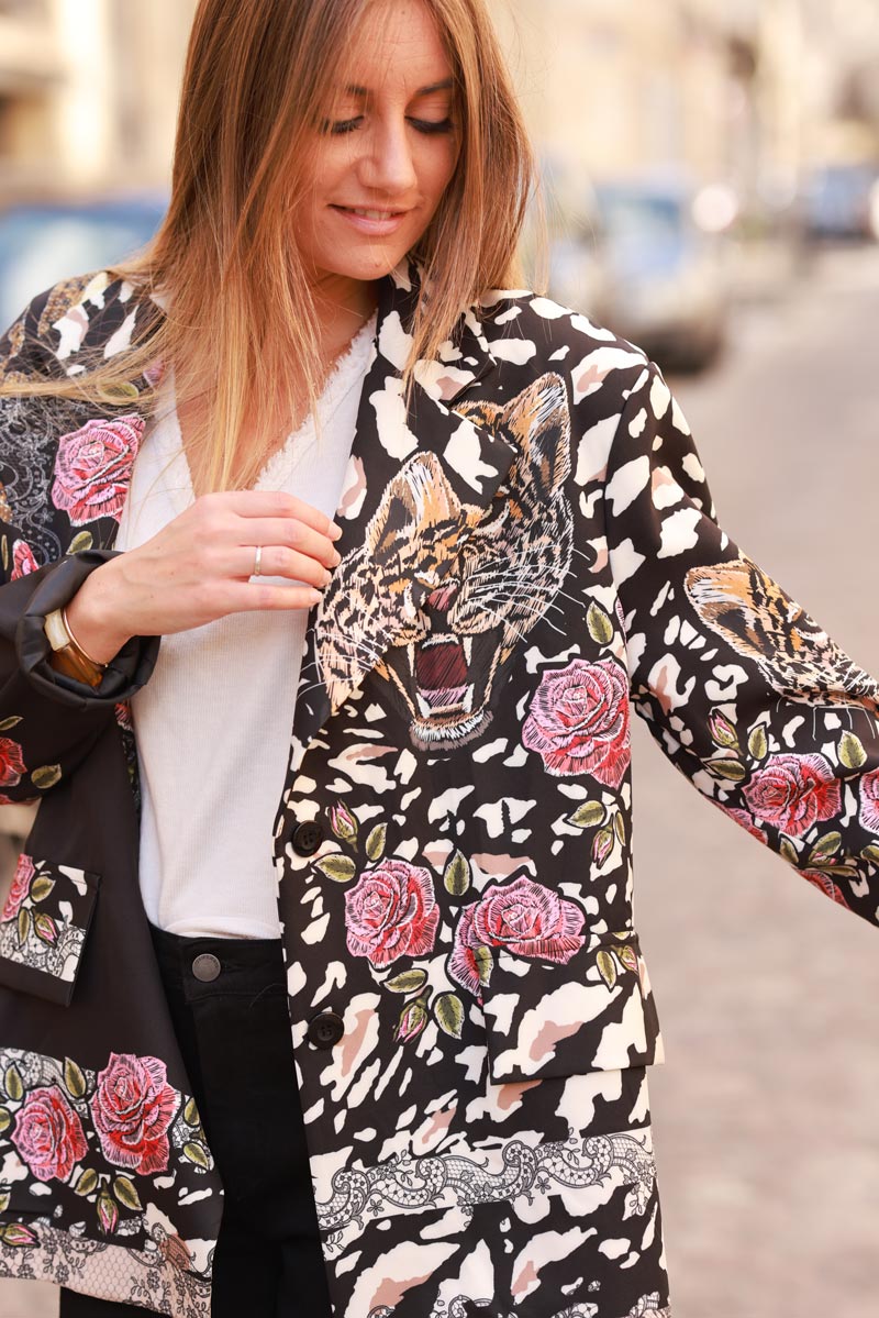 Loose-fit black blazer with tiger, leopard, and floral print