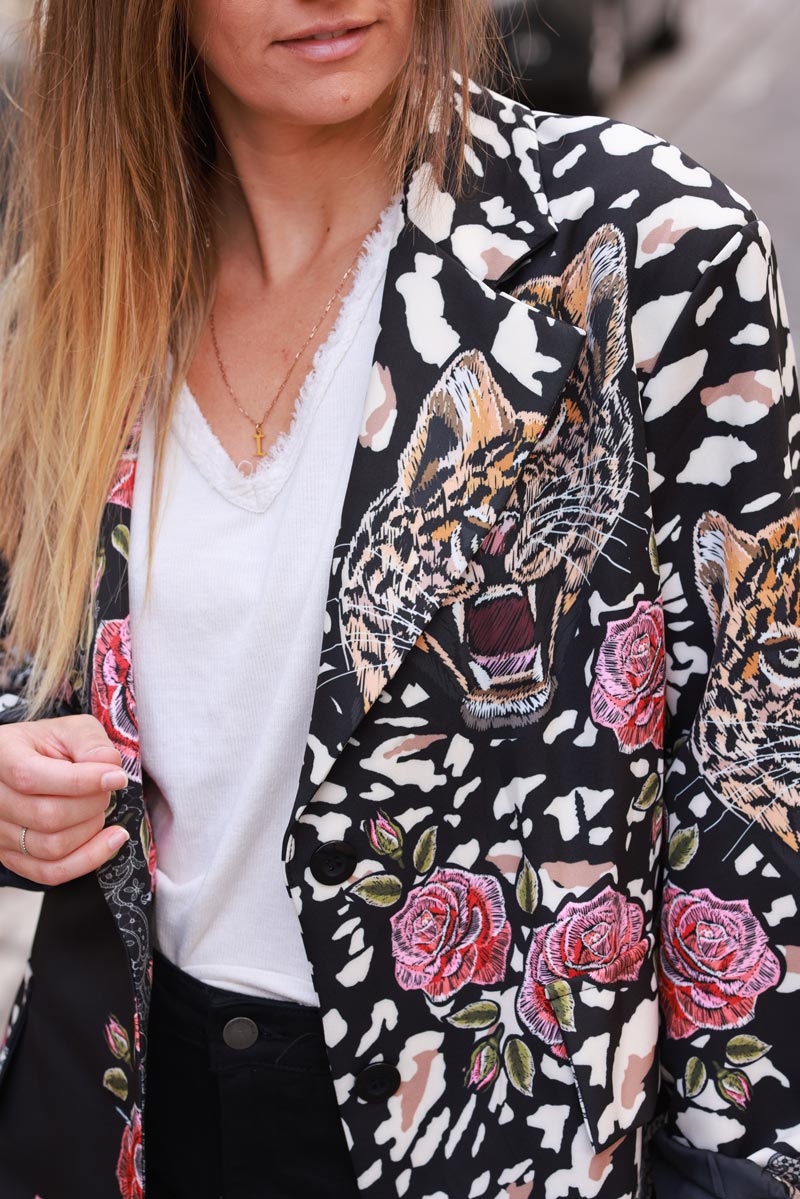 Loose-fit black blazer with tiger, leopard, and floral print