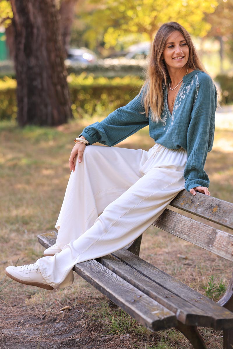 Dark celadon green cotton gauze blouse with blue paisley embroidery