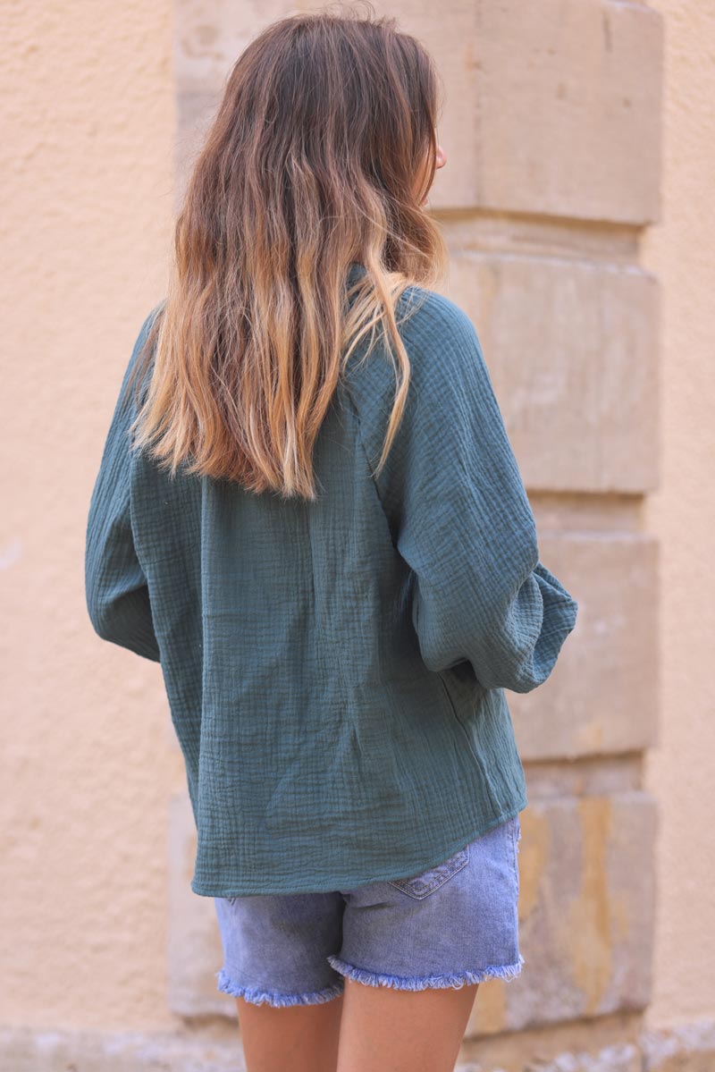 Dark celadon green cotton gauze blouse with blue paisley embroidery