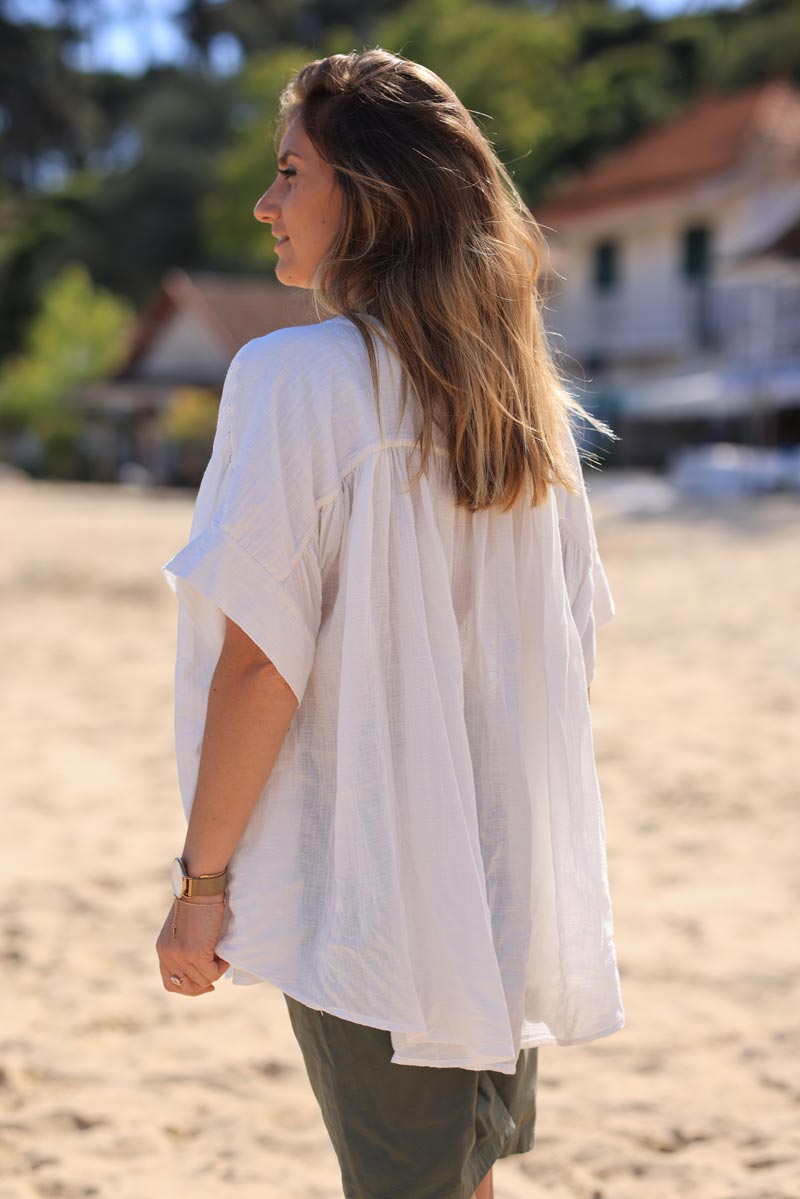 Off white floaty oversized blouse with mother of pearl buttons