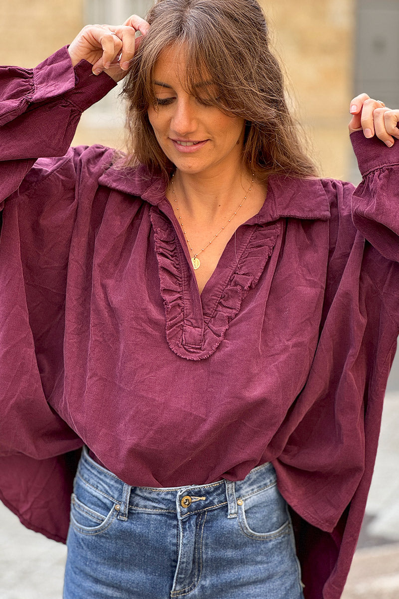 Blouse large aubergine en velours côtelé fin col v froufrou