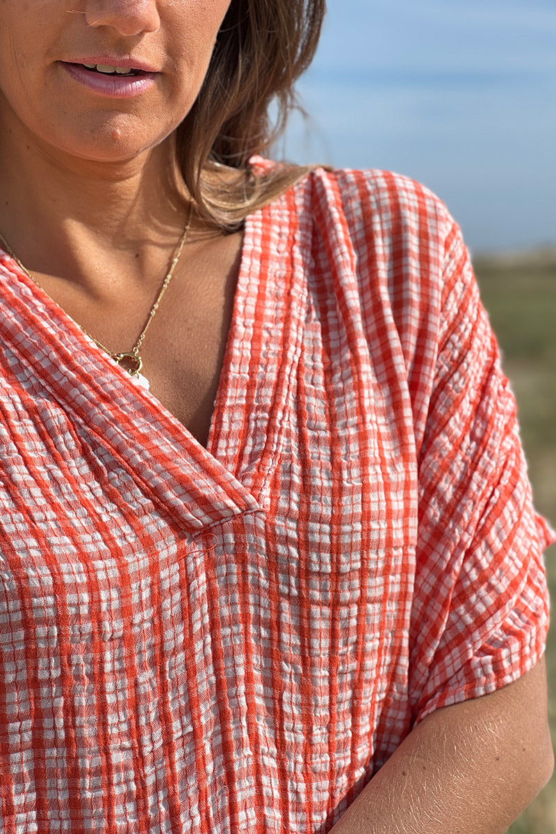 Blouse large en gaze de coton à rayures et carreaux vichy orange manches courtes