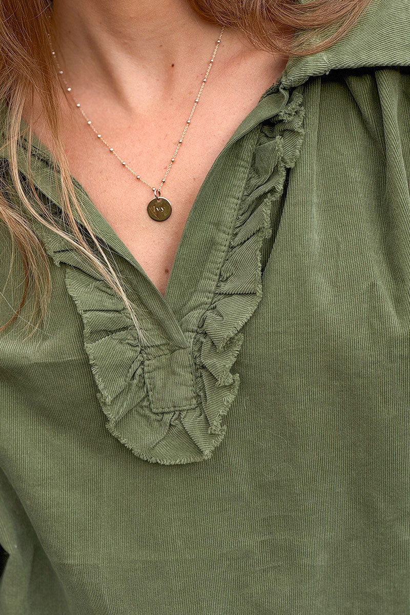 Blouse large kaki en velours cotele fin col v froufrou