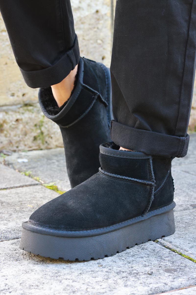 Bottes noires basses en cuir fourrées à plateforme