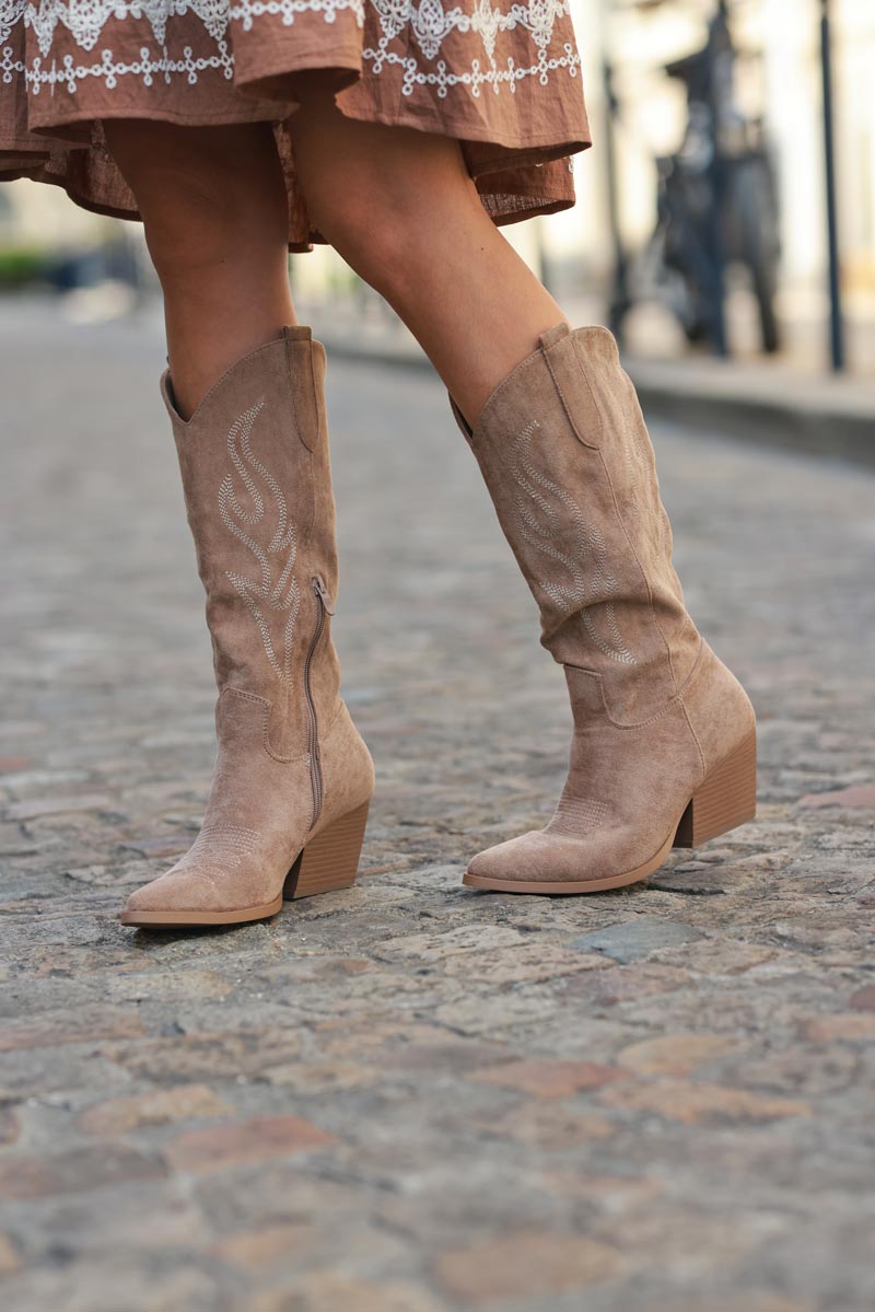 Taupe cowboy boots with embroidery, heel, and pointed toe