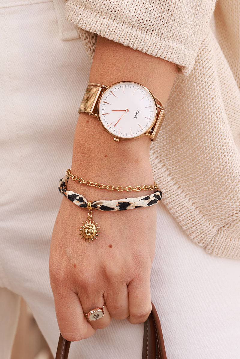Bracelet chaîne dorée et ruban léopard pendentif soleil