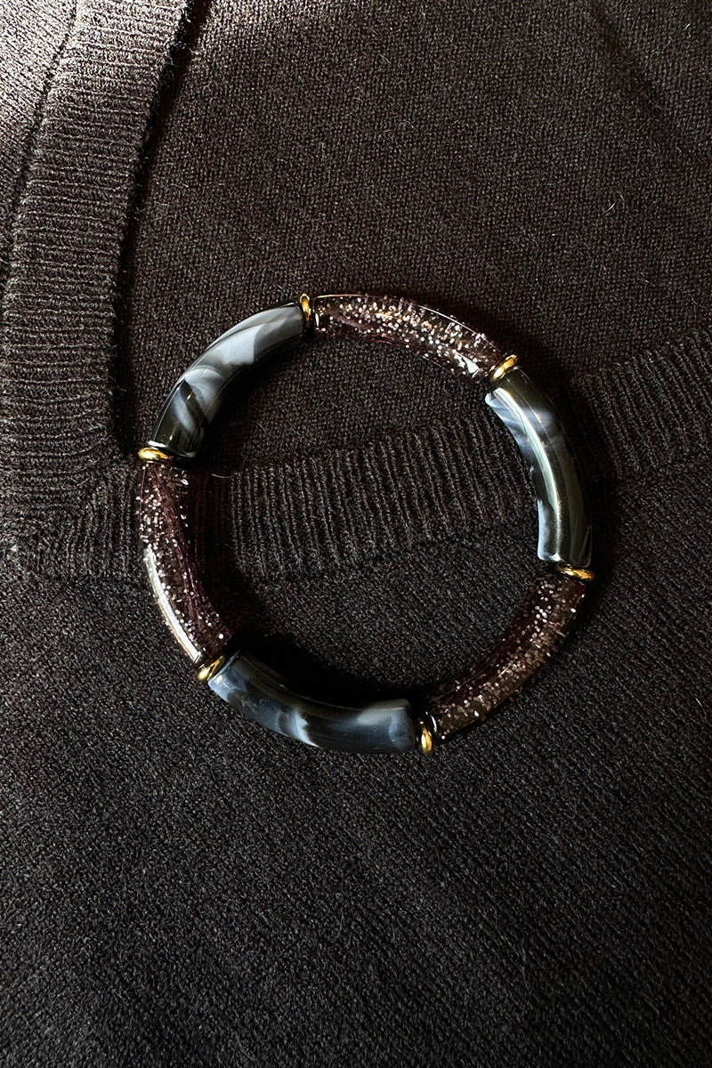 Bracelet élastique style jonc en perles fines acétate marbrées noir et paillettes