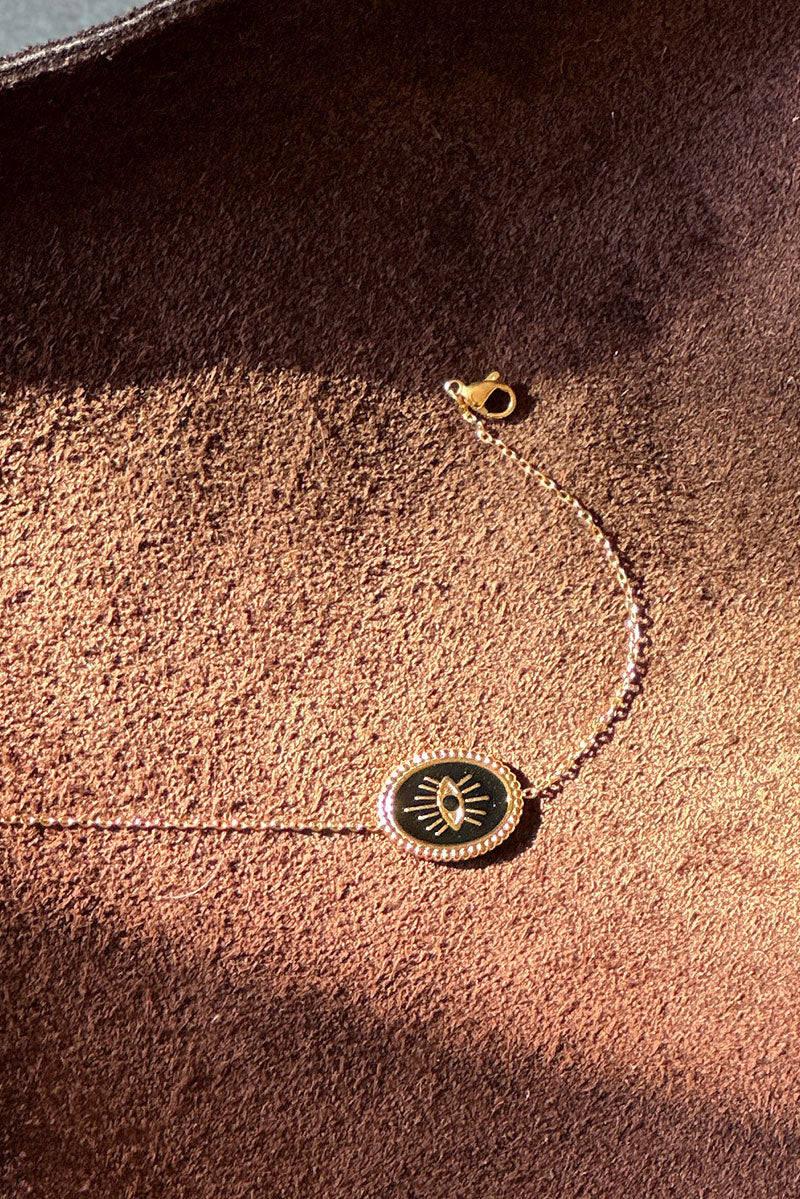 Bracelet petite maille dorée œil noir