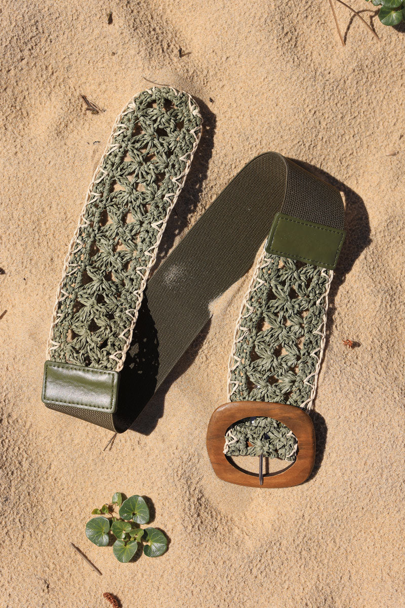 Khaki woven raffia style elasticated belt with wooden buckle