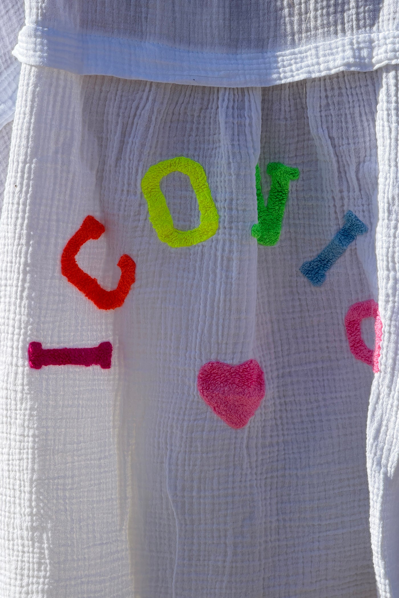 White “ICONIC” Crinkle Gauze Button-Down Top

