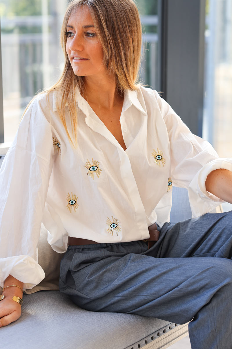 White cotton shirt with eye and sequin embroidery