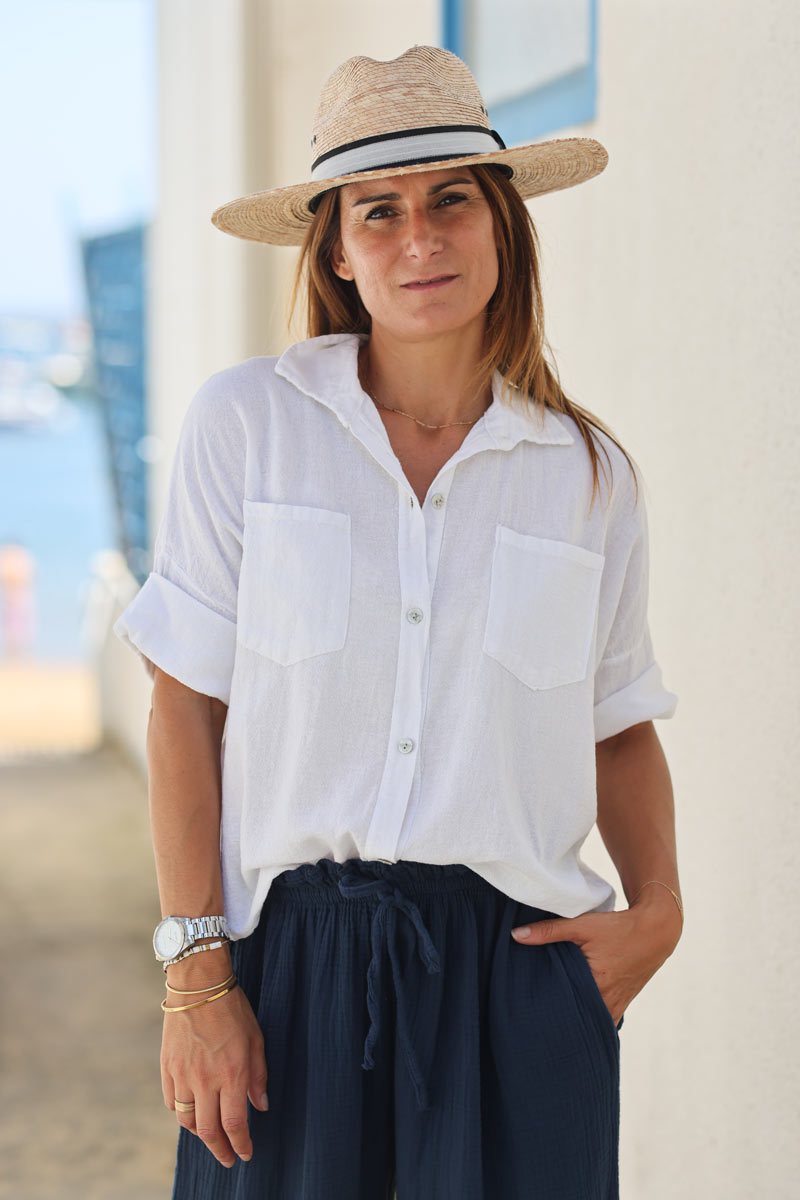 White soft cotton blouse with 3/4 sleeves and large pockets