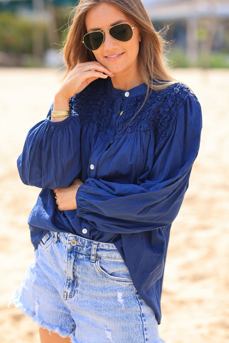 Smocked navy blue floaty blouse with mother of pearl buttons