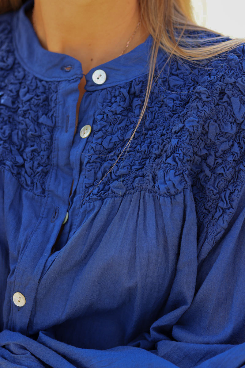 Smocked navy blue floaty blouse with mother of pearl buttons