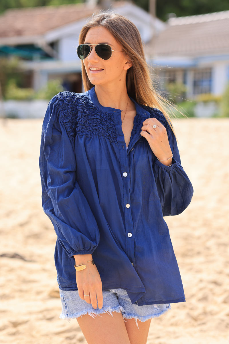 Smocked navy blue floaty blouse with mother of pearl buttons