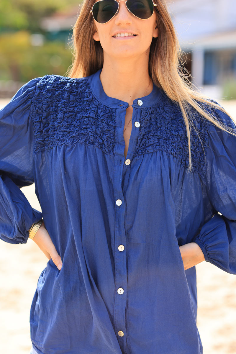 Smocked navy blue floaty blouse with mother of pearl buttons