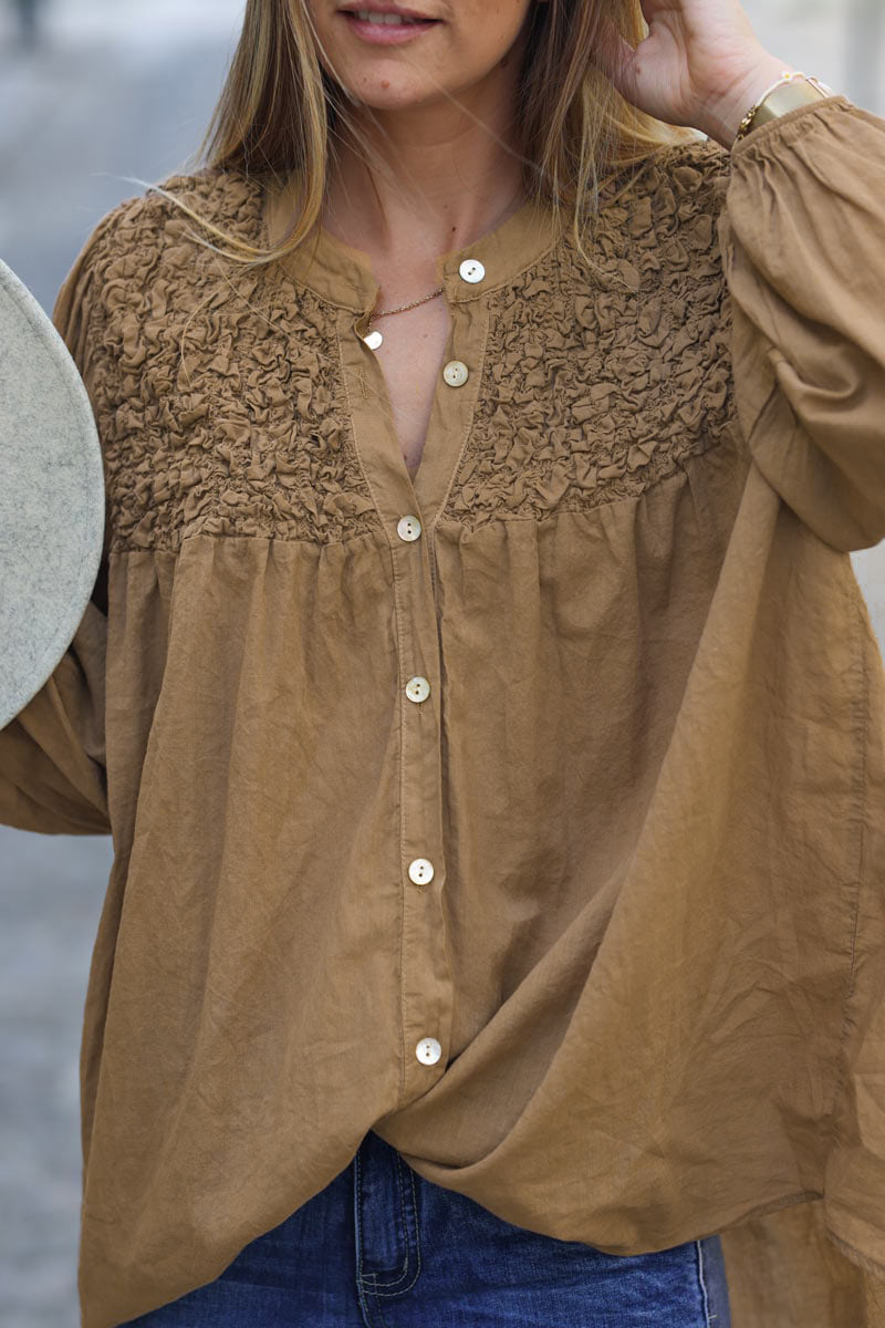 Smocked camel floaty blouse with mother of pearl buttons