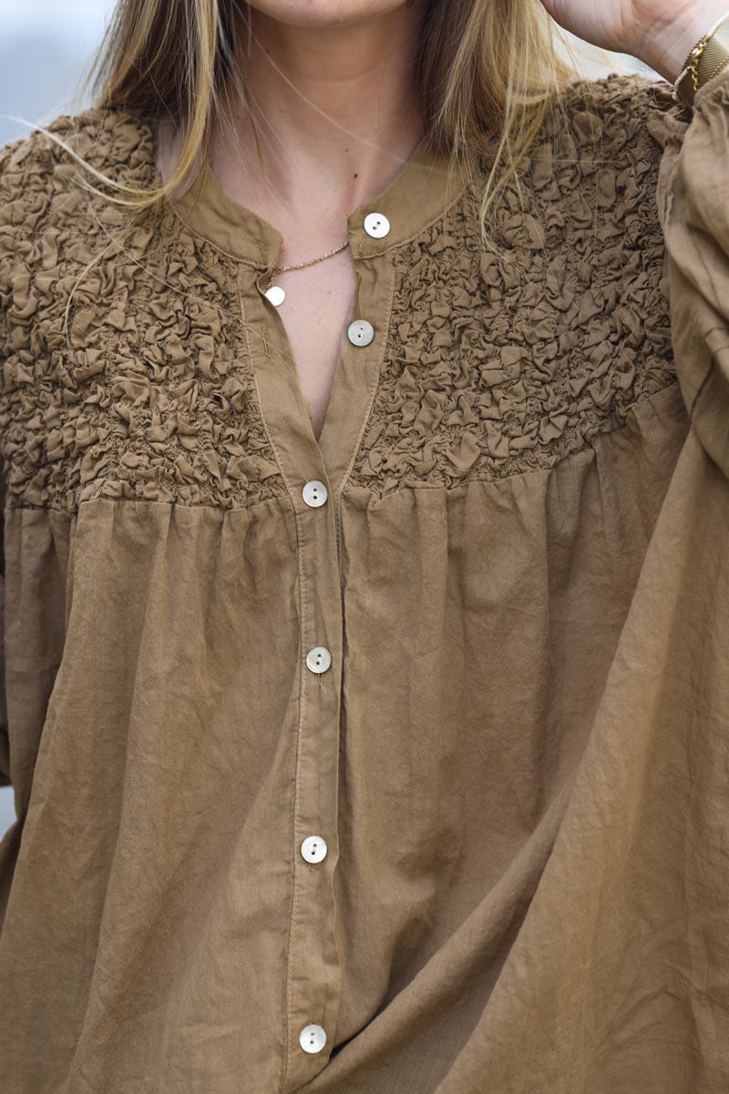 Smocked camel floaty blouse with mother of pearl buttons