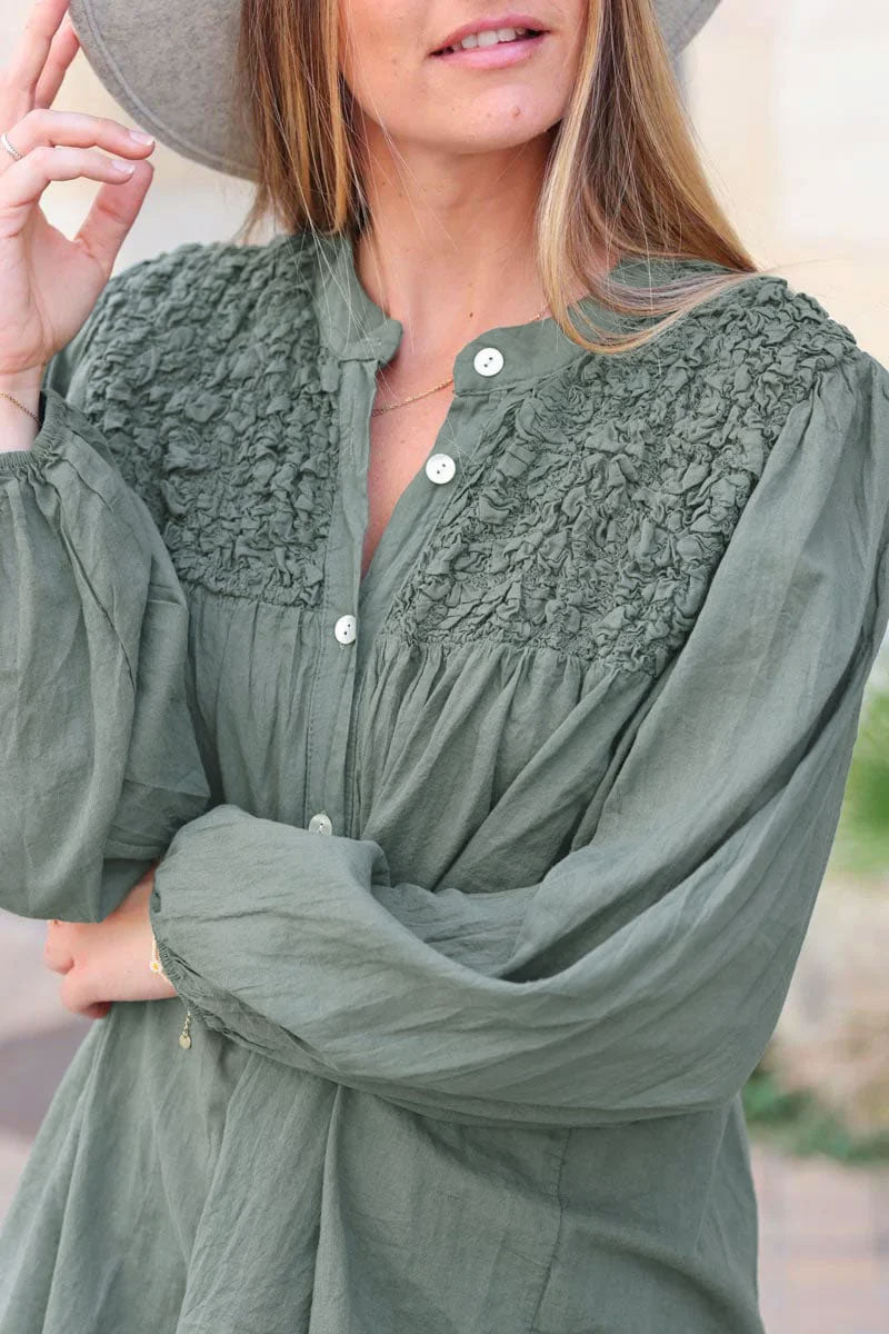 Smocked khaki floaty blouse with mother of pearl buttons