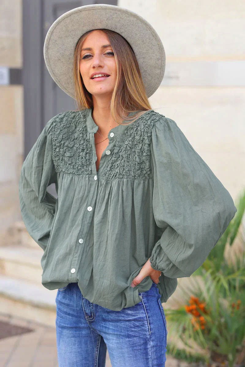 Smocked khaki floaty blouse with mother of pearl buttons