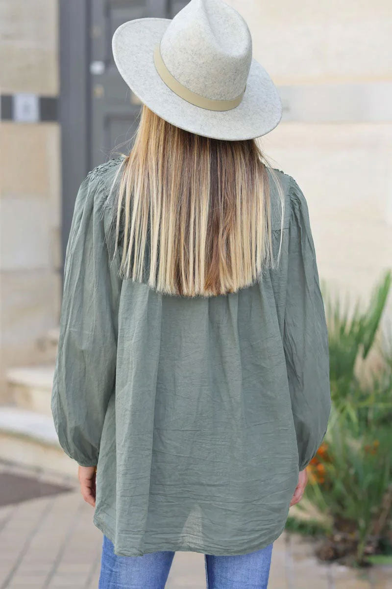 Smocked khaki floaty blouse with mother of pearl buttons