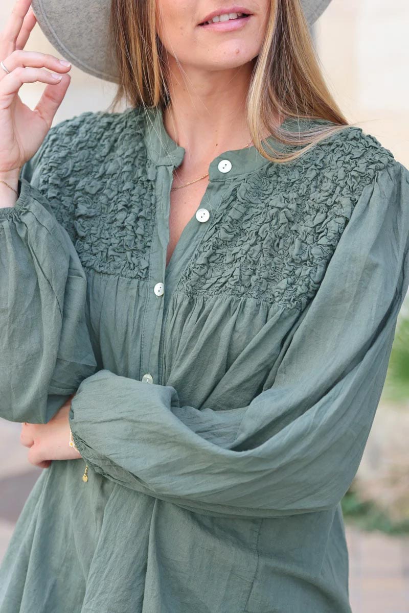 Smocked khaki floaty blouse with mother of pearl buttons