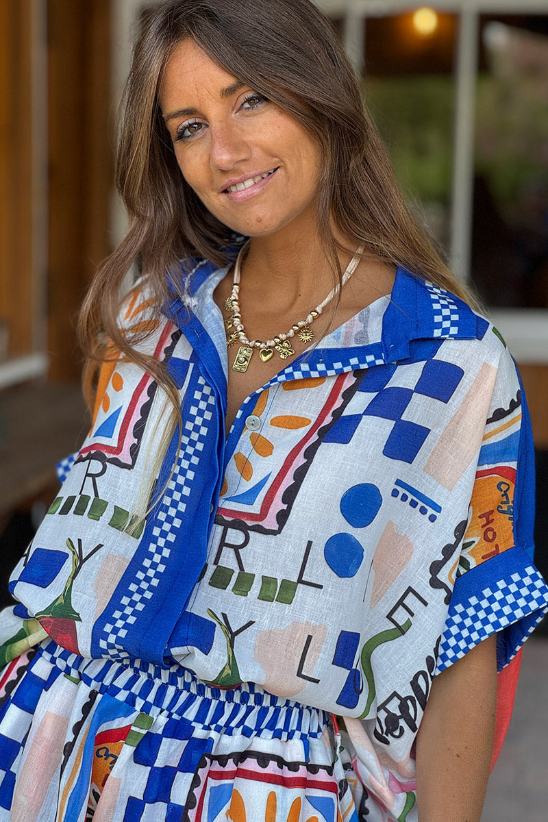 Chemise large à manches courtes looses soleil spicy graphisme bleu
