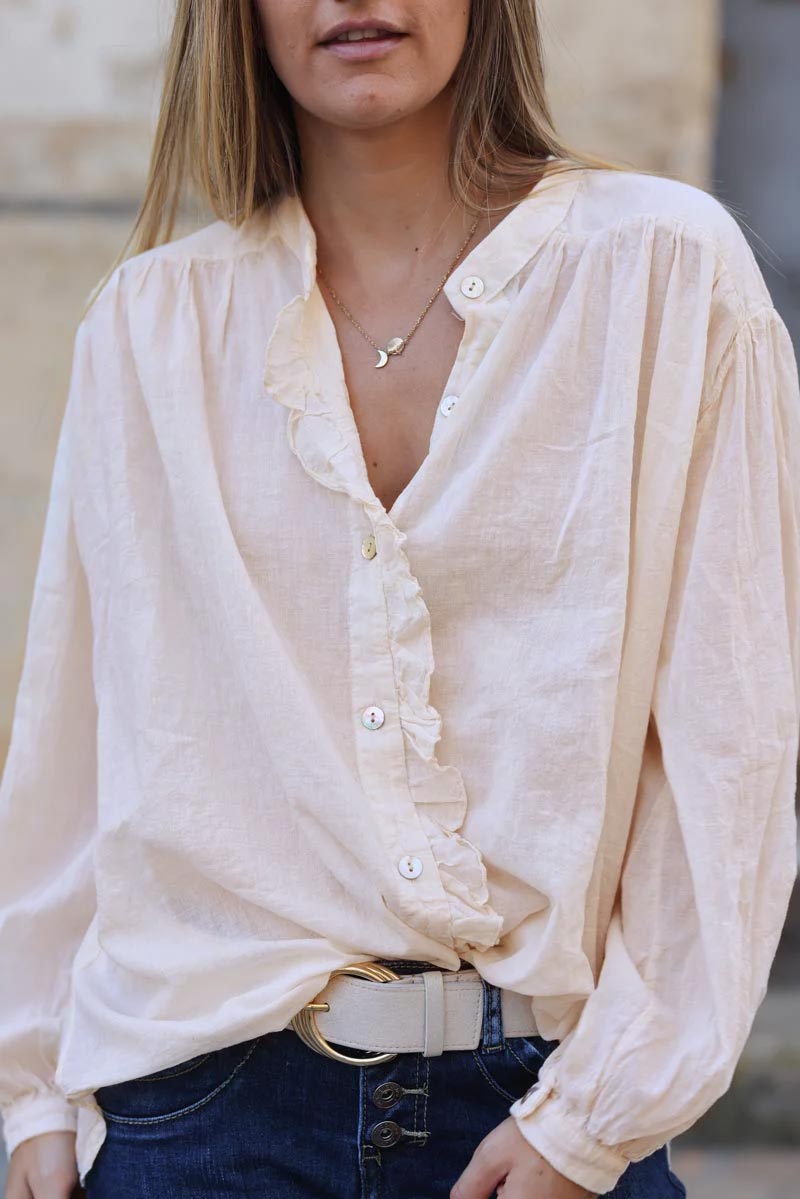 Oversized ecru shirt with frill collar and button seams