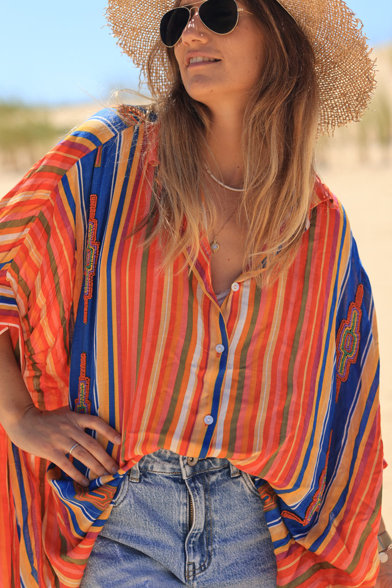 Oversized floaty shirt with orange stripes and colorful pearl detail