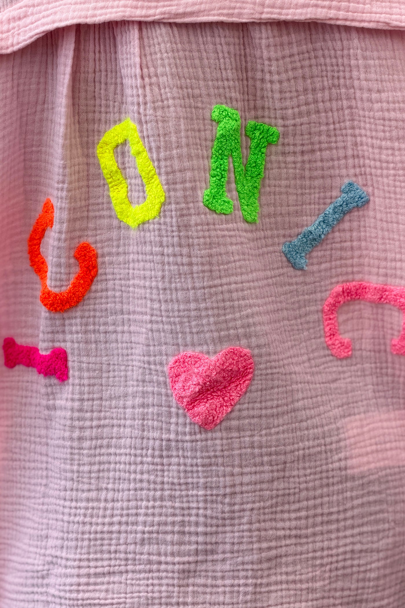 Pink “ICONIC” Crinkle Gauze Button-Down Top
