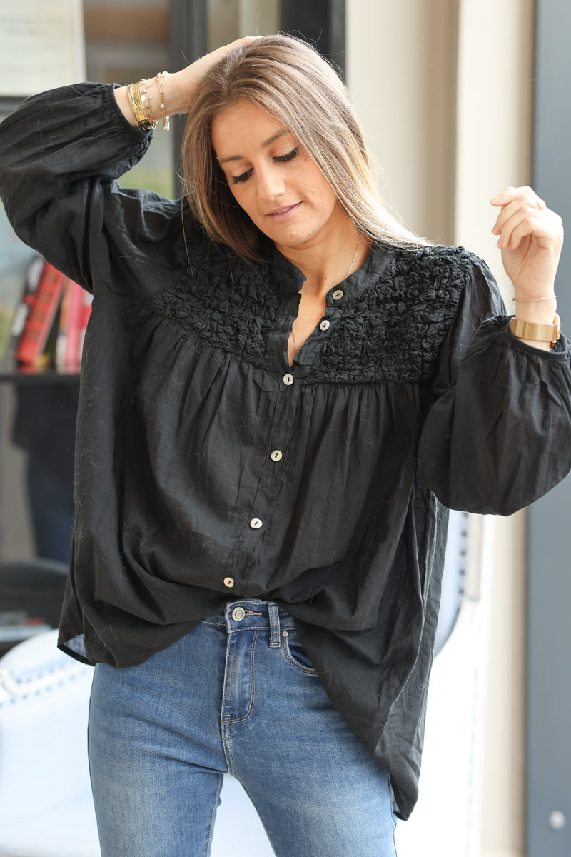 Smocked black floaty blouse with mother of pearl buttons