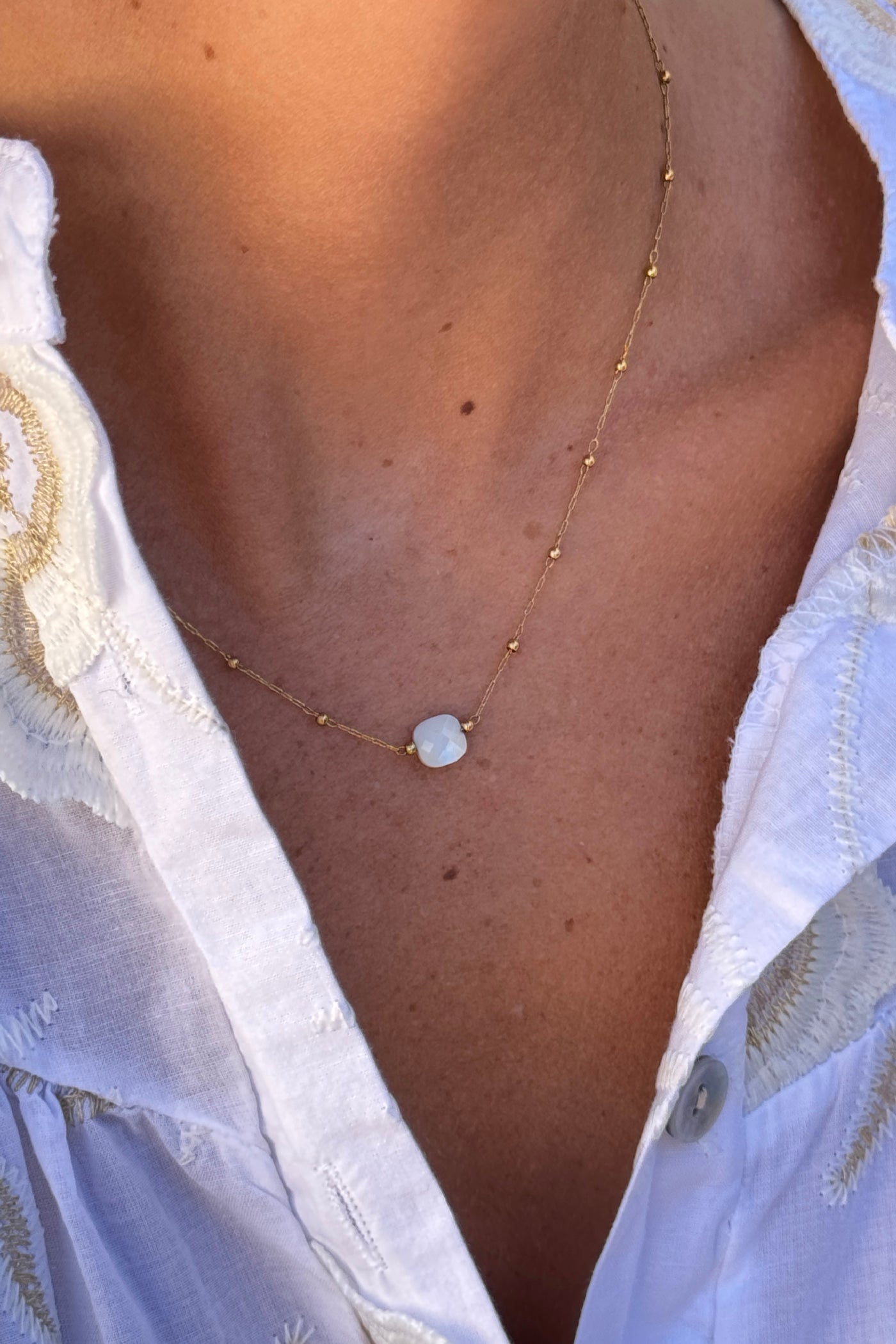 White Faceted Bead Goldtone Necklace
