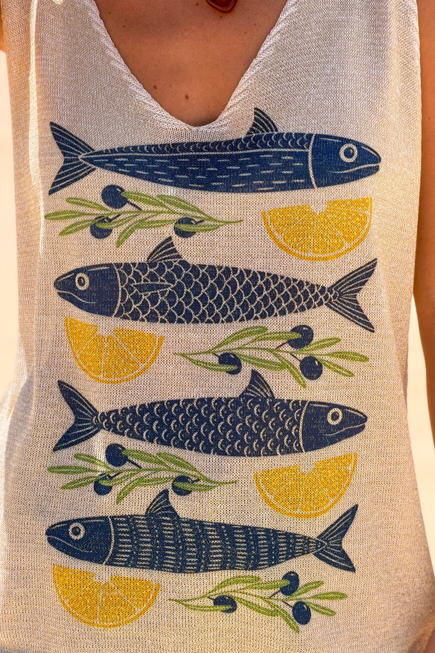 Débardeur en maille brillante lurex poissons et citrons