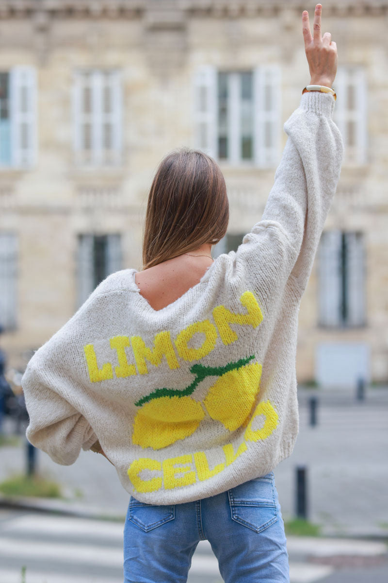 Gilet beige en grosse maille et gros boutons citron limoncello au dos