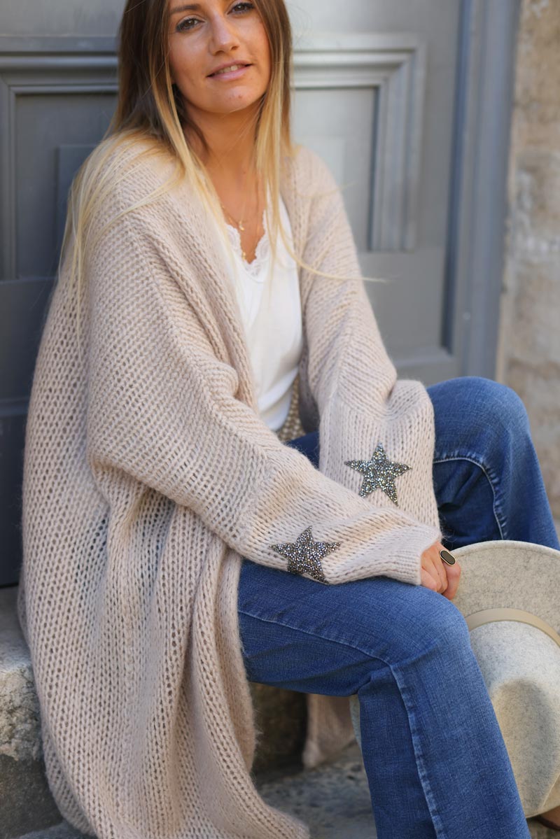 Beige medium long chunky knit cardigan with rhinestone star detail