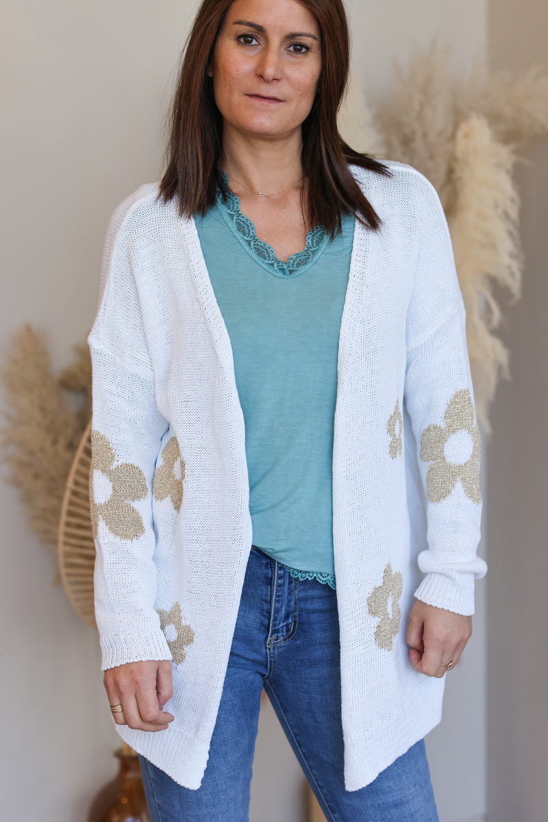 White cotton knit cardigan with large gold flowers