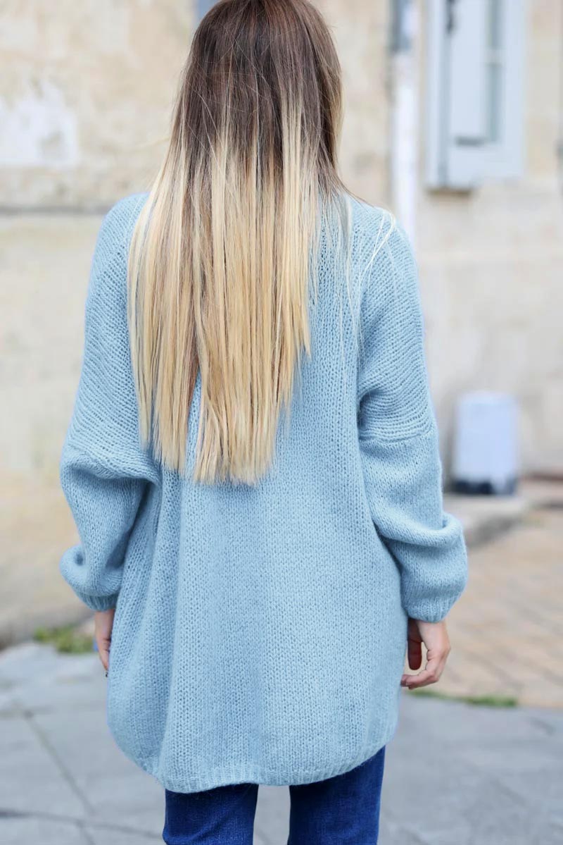 Gilet bleu ciel col enveloppant avec poches