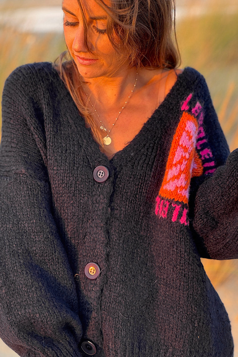 Gilet bleu marine en grosse maille avec gros boutons le Soleil manches bouffantes