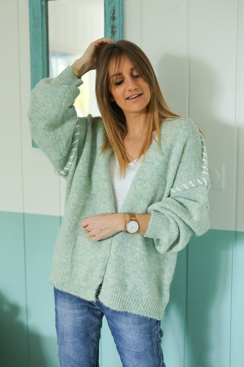 Chunky knit water green cardigan with inside out stitch detail