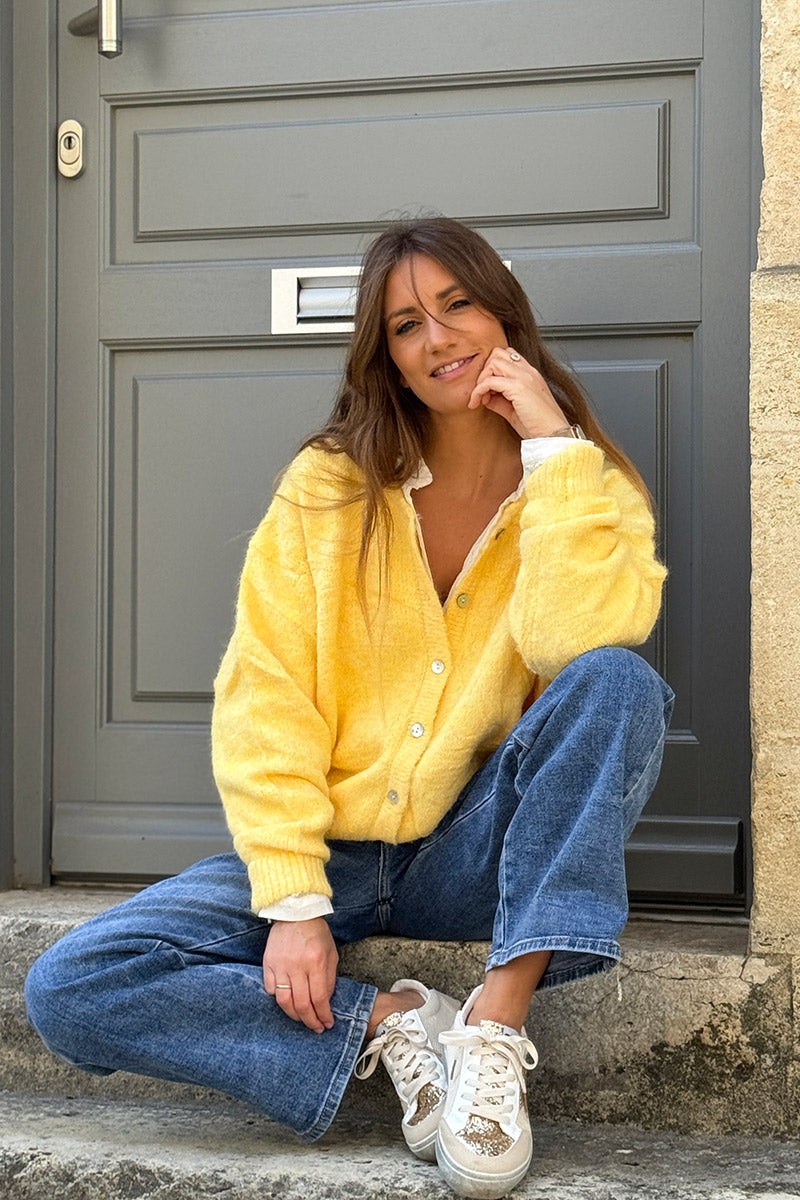 Gilet douillet jaune chiné en maille col rond boutons nacrés