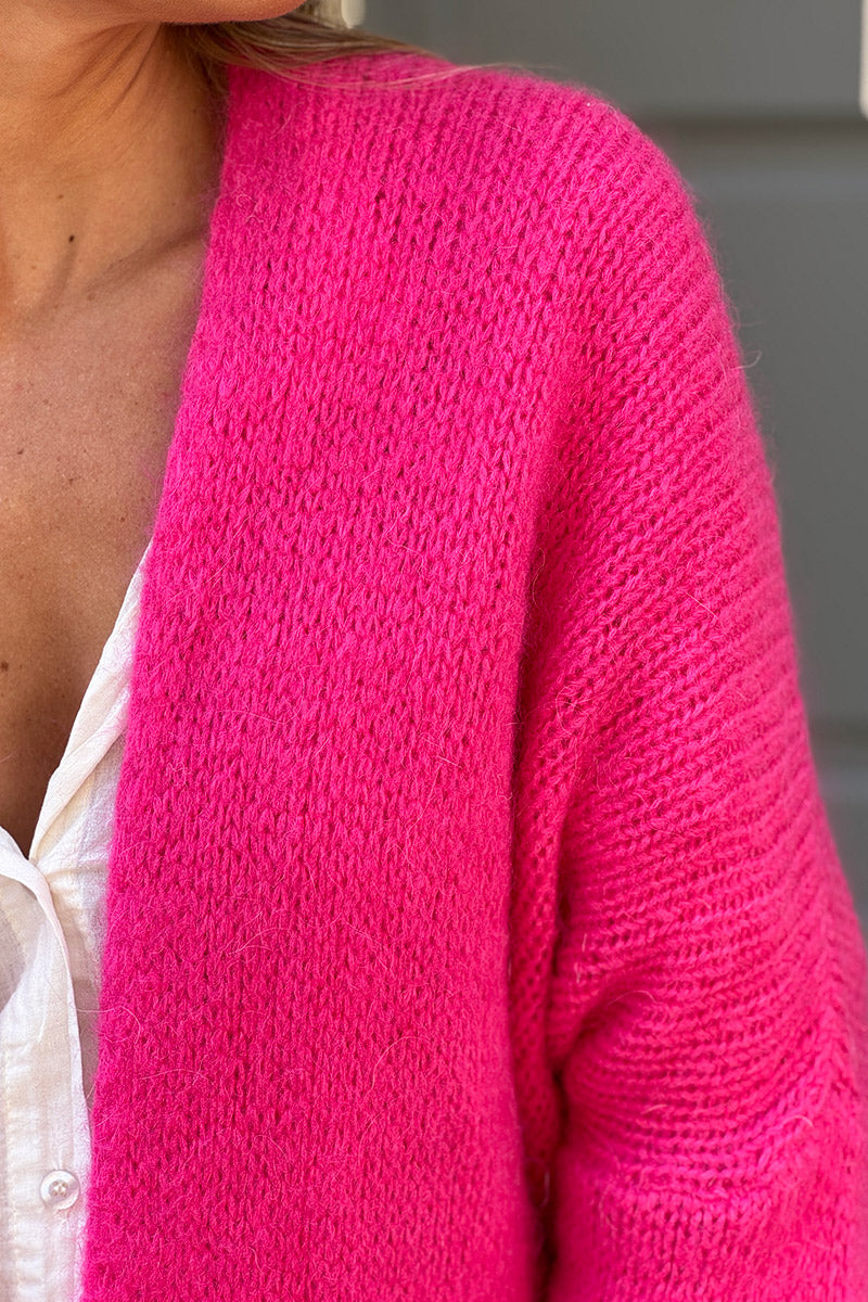 Gilet fuchsia col enveloppant avec poches