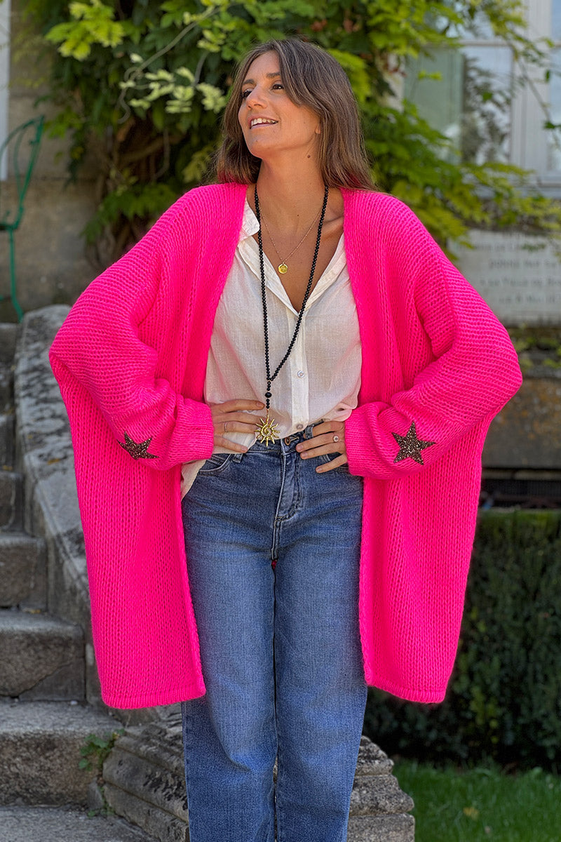 Gilet fuchsia fluo mi long grosses mailles étoile strass manches