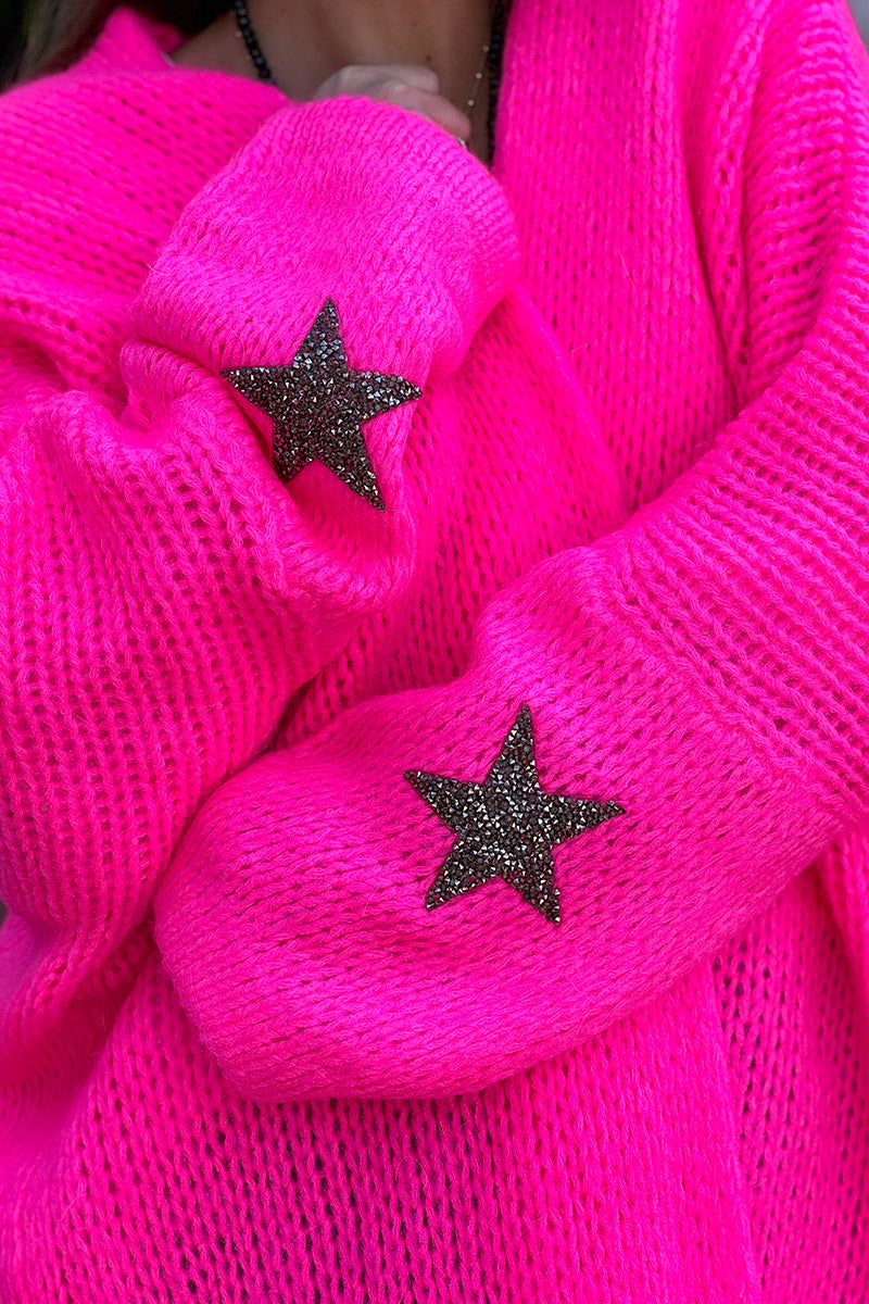 Gilet fuchsia fluo mi long grosses mailles étoile strass manches