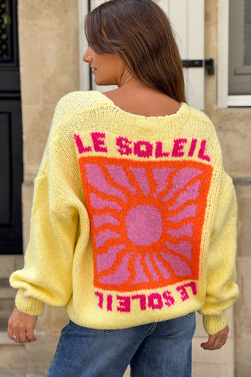 Gilet jaune pâle en grosse maille avec gros boutons le Soleil manches bouffantes