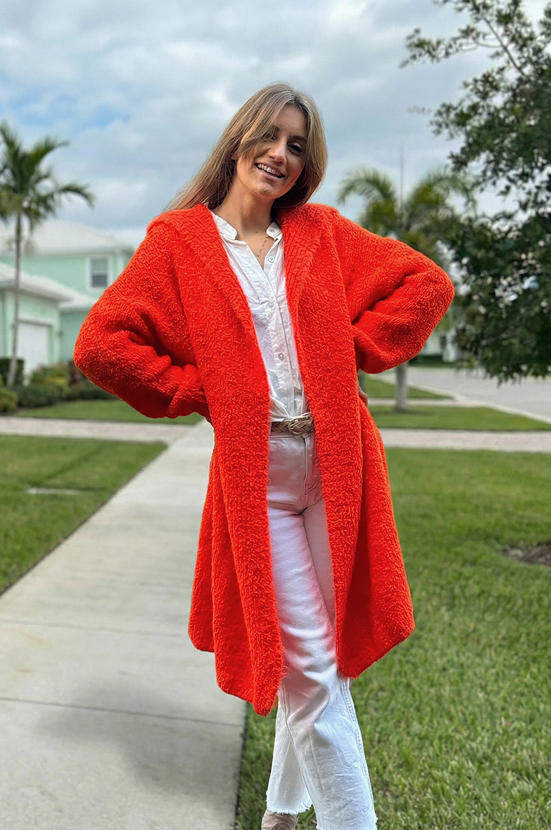 Gilet long à capuche en maille bouclettes orange