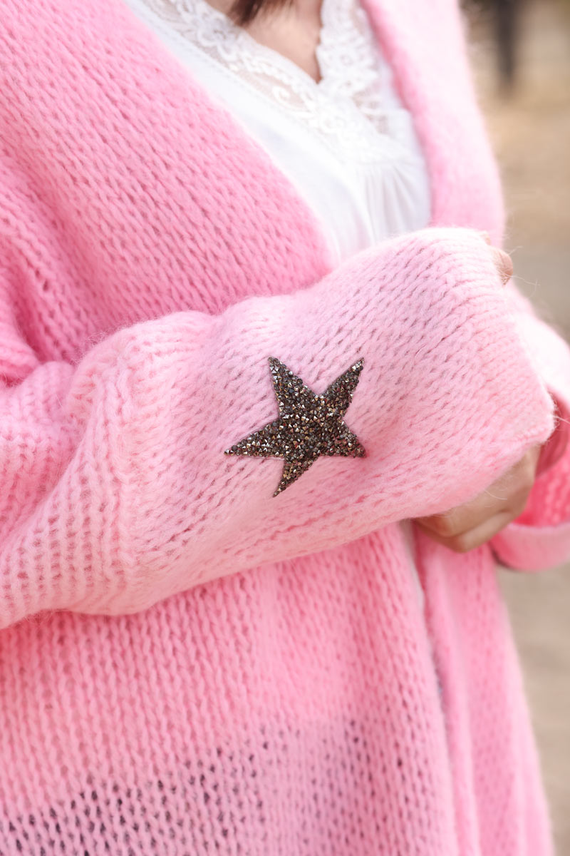 Cárdigan rosa de largo medio con mangas grandes de punto con forma de estrella y strass