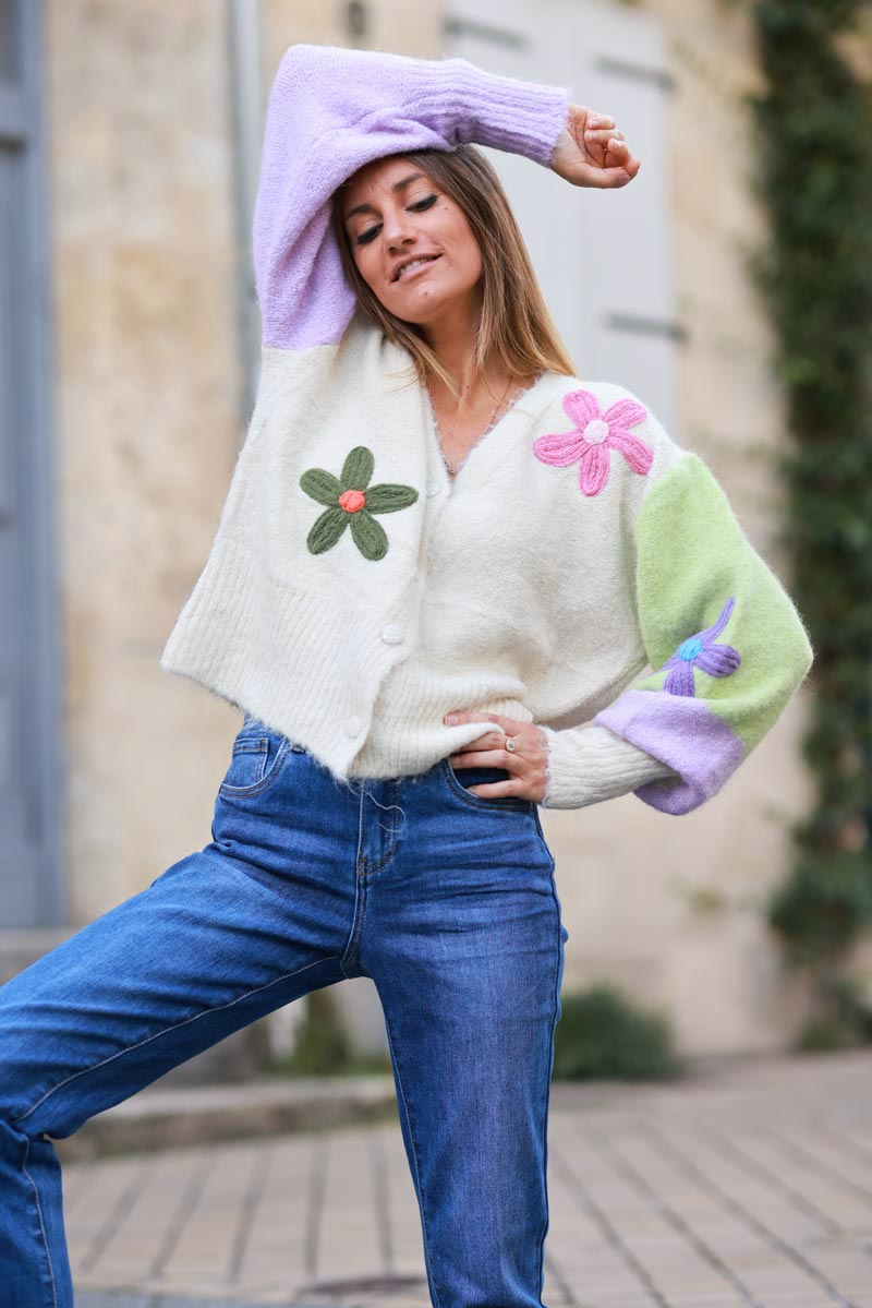 Ecru soft knit cardigan with colorful sleeves and flower embroidery